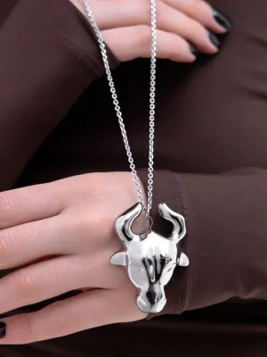 Декоративна керамічна прикраса "Телець срібний" на чорному шнурку