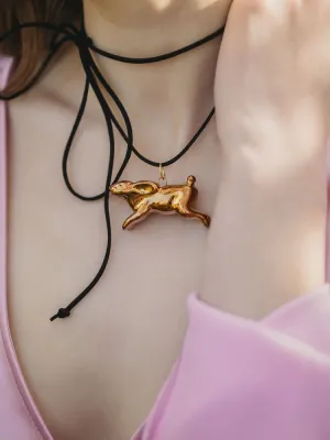 Декоративна керамічна прикраса "Зайченя золоте" на чорному шнурку