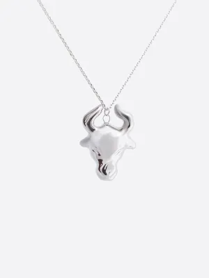 Декоративна керамічна прикраса "Телець срібний" на чорному шнурку